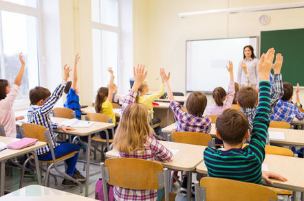 kids_classroom_hands_raised.jpg